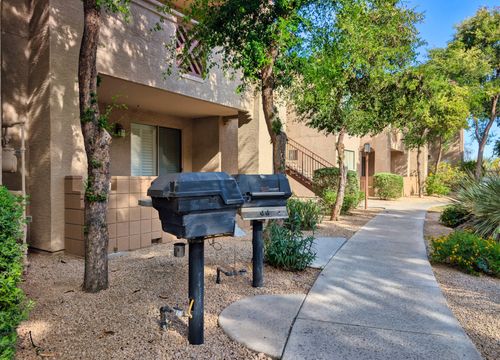 BBQ grill stations between the buildings