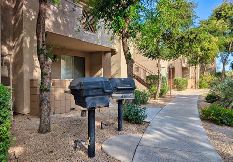 BBQ grill stations between the buildings