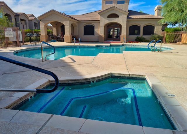 The heated community pool and patio at Terra Vista