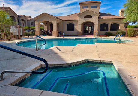 The spa and hot tub beside the pool